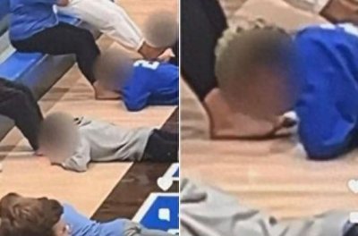 ​美国一学校活动惊现“舔脚趾”竞赛！学生趴地专注舔食同学脚上花生酱
