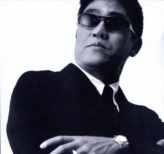 ​柯受良：传奇的娱乐业巨星